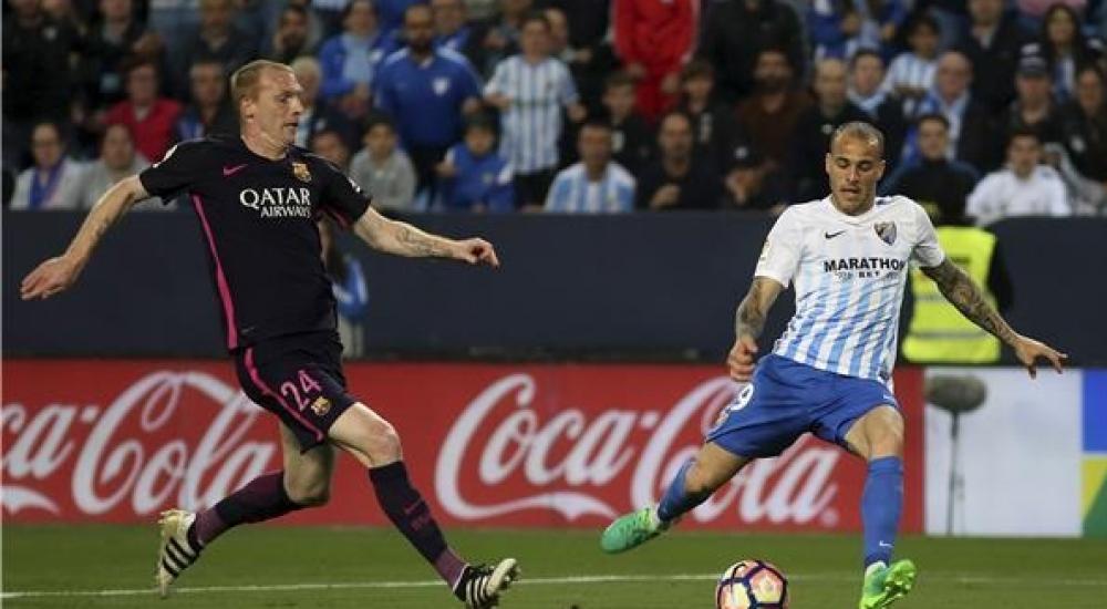 ملقا فاز على برشلونة بهدفين نظيفين