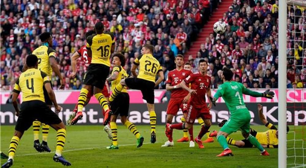 جانب من مباراة سابقة بين دورتموند وبايرن ميونيخ