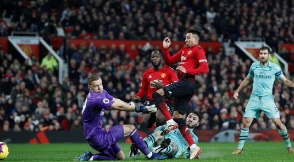 جانب من مباراة سابقة بين آرسنال ومانشستر يونايتد