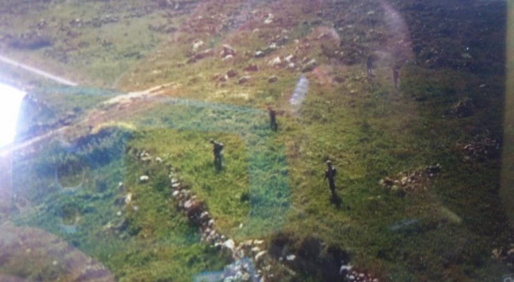 جانب من عمليات التمشيط التي يجريها جيش الاحتلال في منطقة وسط الخليل