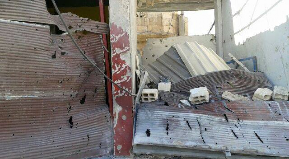 مكان سقوط أحد القذائف في مخيم خان الشيح