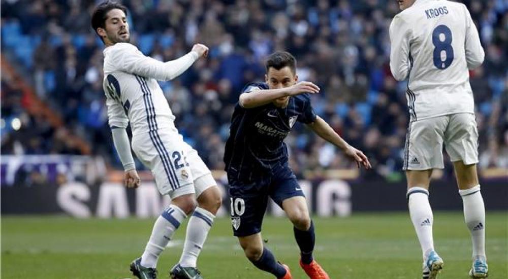 برشلونة ينتظر خسارة الريال أمام ملقا لخطف لقب الدوري الإسباني