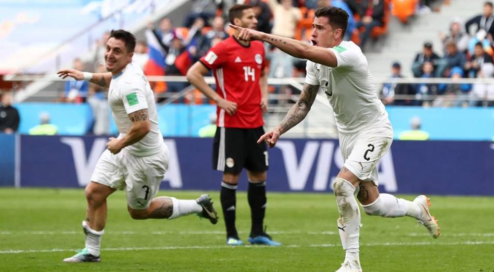 فرحة لاعبي منتخب أوروجواي بهدف المباراة الوحيد