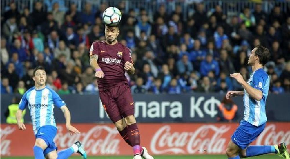 برشلونة فاز على ملقا بهدفين نظيفين