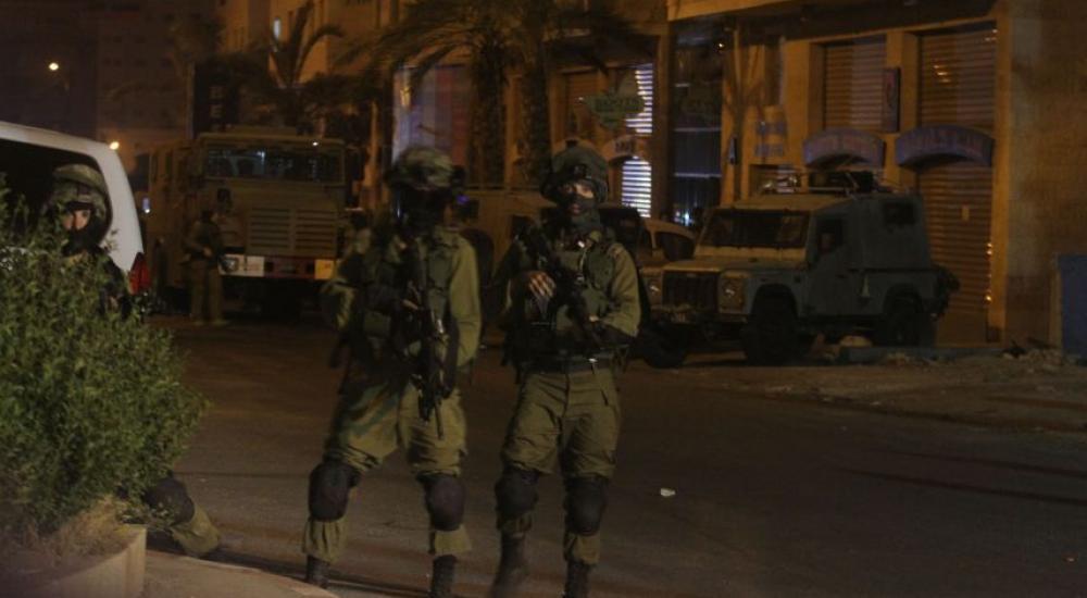 جنود من جيش الاحتلال الإسرائيلي خلال اقتحام مدينة بالضفة الغربية (أرشيف)