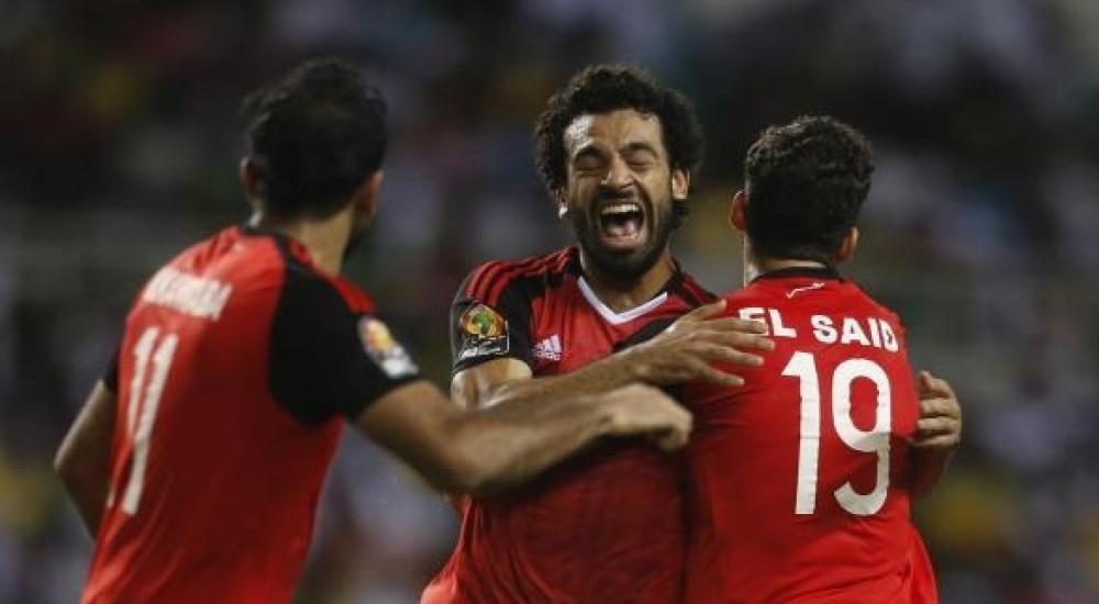 فرحة لاعبي منتخب مصر بالفوز على بوركينا فاسو