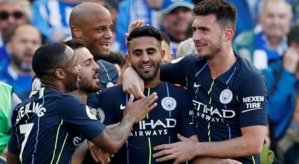 لاعبو مانشستر سيتي يحتفلون بهدف محرز