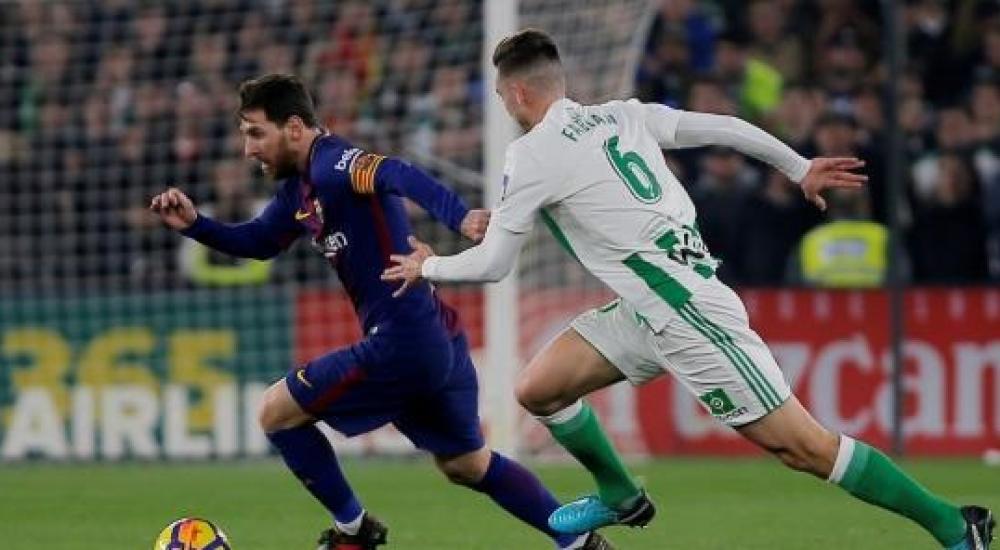 جانب من مباراة سابقة بين برشلونة وريال بيتيس