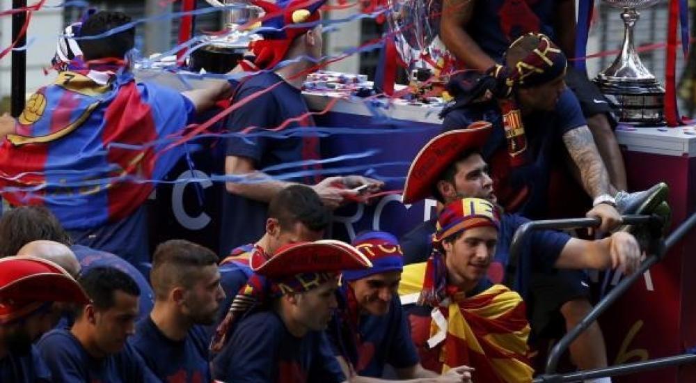 برشلونة أول فريق في أوروبا يفوز بالثلاثية مرتين