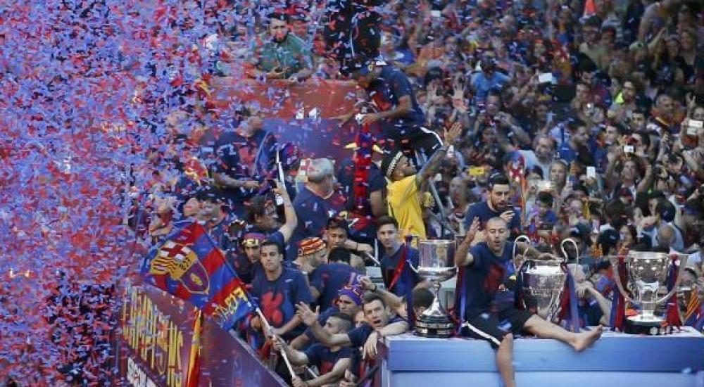 برشلونة أول فريق في أوروبا يفوز بالثلاثية مرتين
