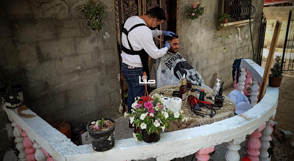 الحلاق محمد البوجي (36 عامًا)