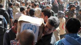 توزيع مساعدات بمخيم اليرموك (أرشيف)