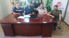 جانب من التوقيع