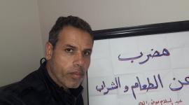 الموظف عوض الله يواجه قرار فصله من "أونروا" بالماء والملح