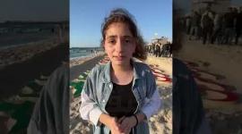 منحوتة رملية بأسماء شهداء العدوان في غزة