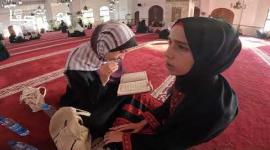 أكثر من 500 حافظ يسردون القرآن الكريم على جلسة واحدة بغزة