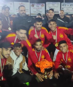 فريق الشهيد طارق الهور متوجًا بالكأس
