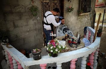 الحلاق محمد البوجي (36 عامًا)