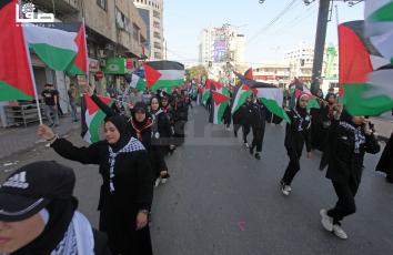 مسير كشفي بالأعلام الفلسطينية تضامنا مع مدينة القدس بغزة