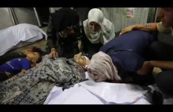 وداع حزين لشهداء القصف الإسرائيلي على مدينة غزة من داخل مستشفى الشفاء