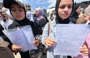 خلال وقفة بعنوان: "بين الحلم والمعبر".. طلاب من غزة يطالبون بحقهم في السفر لاستكمال تعليمهم خارج القطاع