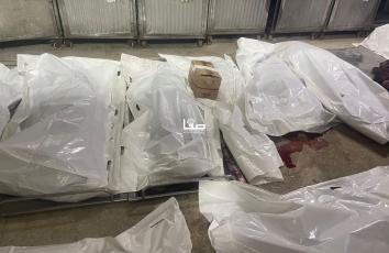 في ثاني أيام عيد الأضحى المبارك.. ثلاجات الموتى في مستشفى الشفاء تمتلئ بجثامين الشهداء